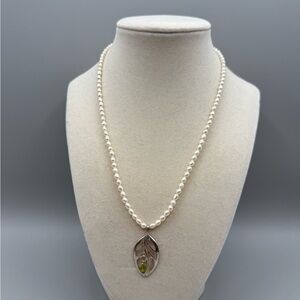 Elegant Pearl Necklace with Silver Leaf Pendant